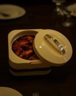 Minimalist Dining Setup with Elegant Food Warmer - Image 3