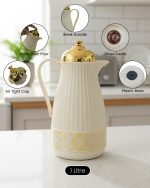 1 Liter luxury vacuum thermos flask with gold top and glass liner, featuring a ribbed body design and push-to-pour button, available in Dark Grey, Grey, and White colors.