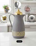 1 Liter luxury vacuum thermos flask with gold top and glass liner, featuring a ribbed body design and push-to-pour button, available in Dark Grey, Grey, and White colors.