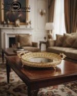 Elevate your home décor and entertaining with this exquisite, ornate gold serving tray. This luxurious decorative metal platter instantly transforms any surface into a dazzling display. Crafted in an opulent Victorian-style with intricate filigree detailing, this piece is the ultimate home accent for those who value timeless glamour.