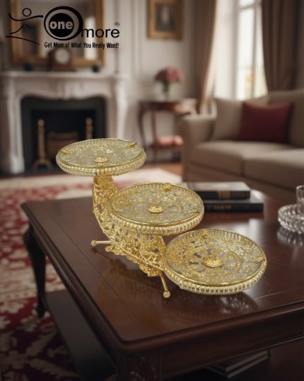 Elevate your entertaining and home decor with this breathtaking Gold Crescent Moon Three-Tier Serving Platter. Crafted with an intricate, scrolled gold-tone metal stand, this unique centerpiece is designed in an artistic crescent-moon shape, supporting three beautifully detailed glass serving bowls. Whether you're presenting candies and chocolates, a selection of dried fruits and nuts, or an array of delicate pastries and desserts (as shown in the images), this decorative stand adds an instant touch of classic luxury and opulence to any setting. Its grand, eye-catching design makes it a perfect focal point for a coffee table, dining table, or buffet. Ideal for holiday gatherings, special occasions, or as a stunning gift for lovers of regal and Victorian-inspired decor.