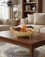 Elevate your home décor and entertaining with this exquisite, ornate gold serving tray. This luxurious decorative metal platter instantly transforms any surface into a dazzling display. Crafted in an opulent Victorian-style with intricate filigree detailing, this piece is the ultimate home accent for those who value timeless glamour.