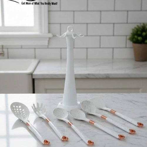 Luxury white marble-look cooking utensil set with rotating holder and rose gold accents. Includes spatula, spoon, and pasta server. Ideal kitchen decor centerpiece.