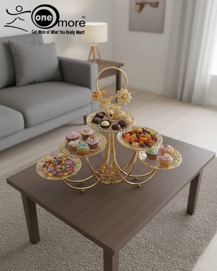 Luxurious gold tiered centerpiece serving stand with desserts and dry fruits on a coffee table. Ornate gold-plated serving tray for dry fruits and sweets. The Opulent Golden Tiered Serving Centerpiece