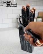Elevate your kitchen counter with the 'One More' Marble & Rose Gold Knife Set