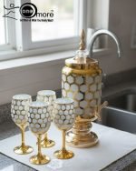 Royal Honeycomb beverage dispenser set with gold base and stemmed goblets in multiple colors (Red, Blue, White).