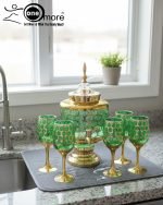 Gold and color-accented honeycomb pattern beverage dispenser and six matching wine glasses set. Available colors include white, teal, emerald green, and navy blue.
