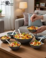 Elegant 14-piece ceramic soup set in six available colors (Black, Navy Blue, Taupe, Slate Grey, Dark Green, Mint Green) featuring scalloped gold rims; includes 1 large serving bowl, 6 small soup bowls, 1 serving spoon, and 6 individual soup spoons, displayed on a kitchen countertop.