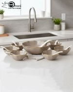 Elegant 14-piece ceramic soup set in six available colors (Black, Navy Blue, Taupe, Slate Grey, Dark Green, Mint Green) featuring scalloped gold rims; includes 1 large serving bowl, 6 small soup bowls, 1 serving spoon, and 6 individual soup spoons, displayed on a kitchen countertop.