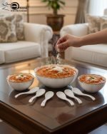 14-piece ceramic soup bowl and spoon set featuring a large serving bowl, six individual bowls, and seven matching spoons, all with a rich color glaze and elegant hand-painted gold rim, available in five colors: black, green, white, taupe, and deep teal.