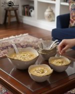 14-piece ceramic soup set in 5 colors (White, Black, Green, Blue, Pink) with gold beaded rim detailing, including one serving bowl, six individual bowls, and seven spoons.