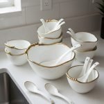 14-piece ceramic soup set in 5 colors (White, Black, Green, Blue, Pink) with gold beaded rim detailing, including one serving bowl, six individual bowls, and seven spoons.