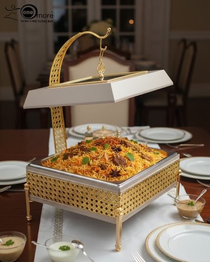 Royal buffet chafing dish set in 4 liter size, featuring a luxurious gold and cream stand, hydraulic lid, and visible canned heat holder (buffet burner) on a dark counter.