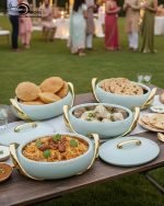 Elegant insulated casserole dish set with gold accents for serving hot food, available in white, sky blue, and blue in 2.5, 3, and 3.5-liter sizes.