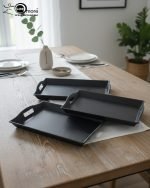 Set of 3 rectangular fiber serving trays in black, brown, and white colors, featuring non-slip texture and ergonomic handles for serving food and beverages.