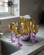 Luxury painted glass water set: 1 jug, 6 stemmed glasses with gold and vibrant color metallic finish.