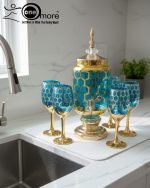 Royal Honeycomb beverage dispenser set with gold base and stemmed goblets in multiple colors (Red, Blue, White).