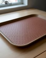 Set of 3 non-slip fiber serving trays in grey and rust brown colors.