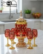 Royal Honeycomb beverage dispenser set with gold base and stemmed goblets in multiple colors (Red, Blue, White).