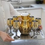 Luxury painted glass water set: 1 jug, 6 stemmed glasses with gold and vibrant color metallic finish.