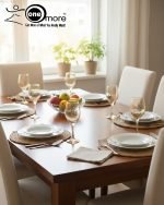 Elegant 7-piece glass water set by One More featuring one amber glass pitcher and six matching goblets, all decorated with a black and gold tulip design.