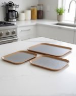 Set of 3 non-slip fiber serving trays in grey and rust brown colors.
