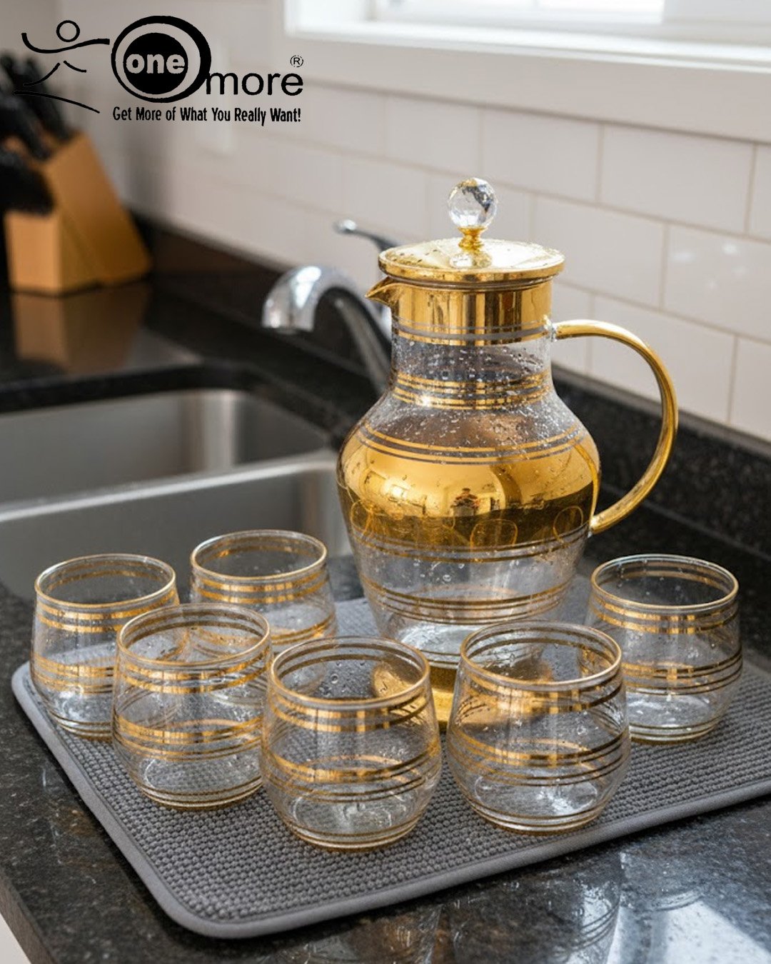 Elegant 7-piece glass beverage set with gold accents including a decanter and six tumblers, shown on a table setting and being used to pour a golden drink. Elegant 7-piece glass beverage set with gold accents including a decanter and six tumblers, shown on a table setting and being used to pour a golden drink.