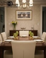 Luxury gold drink dispenser and goblet set with geometric pattern; available in two colors: royal blue/gold and emerald green/gold; featured on a modern kitchen counter.