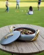 Elegant insulated casserole dish set with gold accents for serving hot food, available in white, sky blue, and blue in 2.5, 3, and 3.5-liter sizes.