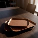 Set of 3 non-slip fiber serving trays in grey and rust brown colors.