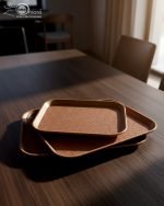 Set of 3 non-slip fiber serving trays in grey and rust brown colors.