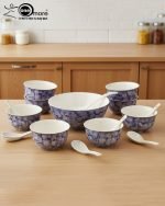 14-piece ceramic soup and ramen bowl set in four color variations: light blue, warm beige, sunset orange, and deep violet marble patterns, all including ceramic spoons and a large serving bowl.