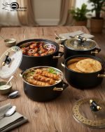 A stacked set of three premium insulated hot pots (1L, 2L, 3.5L) in a crisp white color with decorative gold-toned handles, shown on a marble kitchen countertop. The set features clear acrylic lids and is marketed for keeping food warm.