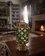 Luxury gold drink dispenser and goblet set with geometric pattern; available in two colors: royal blue/gold and emerald green/gold; featured on a modern kitchen counter.