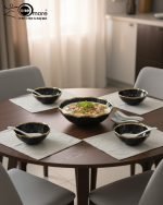 Elegant 14-piece ceramic soup set in six available colors (Black, Navy Blue, Taupe, Slate Grey, Dark Green, Mint Green) featuring scalloped gold rims; includes 1 large serving bowl, 6 small soup bowls, 1 serving spoon, and 6 individual soup spoons, displayed on a kitchen countertop.