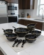 14-piece ceramic soup bowl and spoon set featuring a large serving bowl, six individual bowls, and seven matching spoons, all with a rich color glaze and elegant hand-painted gold rim, available in five colors: black, green, white, taupe, and deep teal.