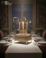 Royal buffet chafing dish set in 4 liter size, featuring a luxurious gold and cream stand, hydraulic lid, and visible canned heat holder (buffet burner) on a dark counter.