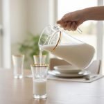 Pasabahce 7-piece Turkish glass water set featuring a textured finish and gold rims, consisting of one jug and six glasses, displayed on a kitchen counter by Onemore Crockery.