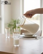 Pasabahce 7-piece Turkish glass water set featuring a textured finish and gold rims, consisting of one jug and six glasses, displayed on a kitchen counter by Onemore Crockery.