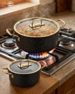 Falez 9-piece non-stick granite cookware set in black with gold handles, including fry pan, casserole, sauce pan, and pots with glass lids, made in Turkey.