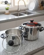 Falez stainless steel pressure cooker set including 6 liter and 9 liter pots with interchangeable pressure and glass lids, made in Turkey, displayed on a kitchen counter by One More.