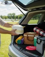 Three One More branded insulated hotpots in black and white marble finishes with gold honeycomb detailing and gold handles, shown in a kitchen and dining room setting with steaming food.