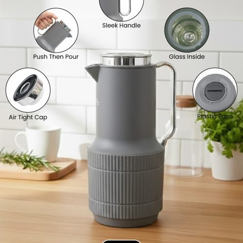 1-liter vacuum insulated thermos flask displaying three color options: green, white, and grey, standing side by side.