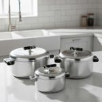 A set of three insulated stainless steel hotpots in 1L, 2L, and 3.5L sizes, featuring a sleek modern design and available in four different colors for kitchen and dining use.