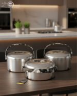 Three-piece insulated stainless steel hotpot set in 2L, 2.5L, and 3.5L capacities, featuring sleek designs in four different color options for food storage and serving.