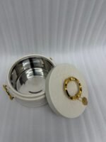 A set of three round, quilted insulated hotpots in varying sizes (1L, 2.5L, and 4L) with gold handles and lid accents, displayed on a kitchen counter and wooden dining table.