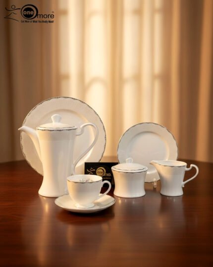Luxury 24-piece white porcelain tea set with a grey marble border and silver floral filigree accents, featuring a teapot, sugar bowl, and matching plates.