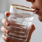 Set of six RCR-inspired crystal whiskey glasses with intricate textured patterns and a luxury gold-plated rim.