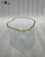 A set of 6 RCR-inspired crystal whiskey glasses featuring vertical cut ridges, a diamond-patterned base, and a luxury gold-plated rim on a white background.