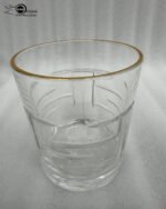 Set of six RCR-inspired crystal whiskey glasses with intricate textured patterns and a luxury gold-plated rim.